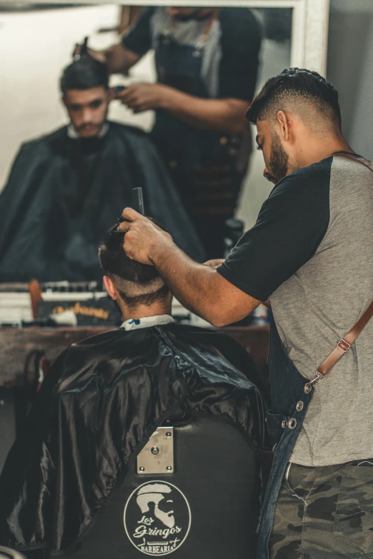 a man getting his hair cut at a barber shop, trending on pexels, thumbnail, behind the scenes photo, ilustration, mechanics