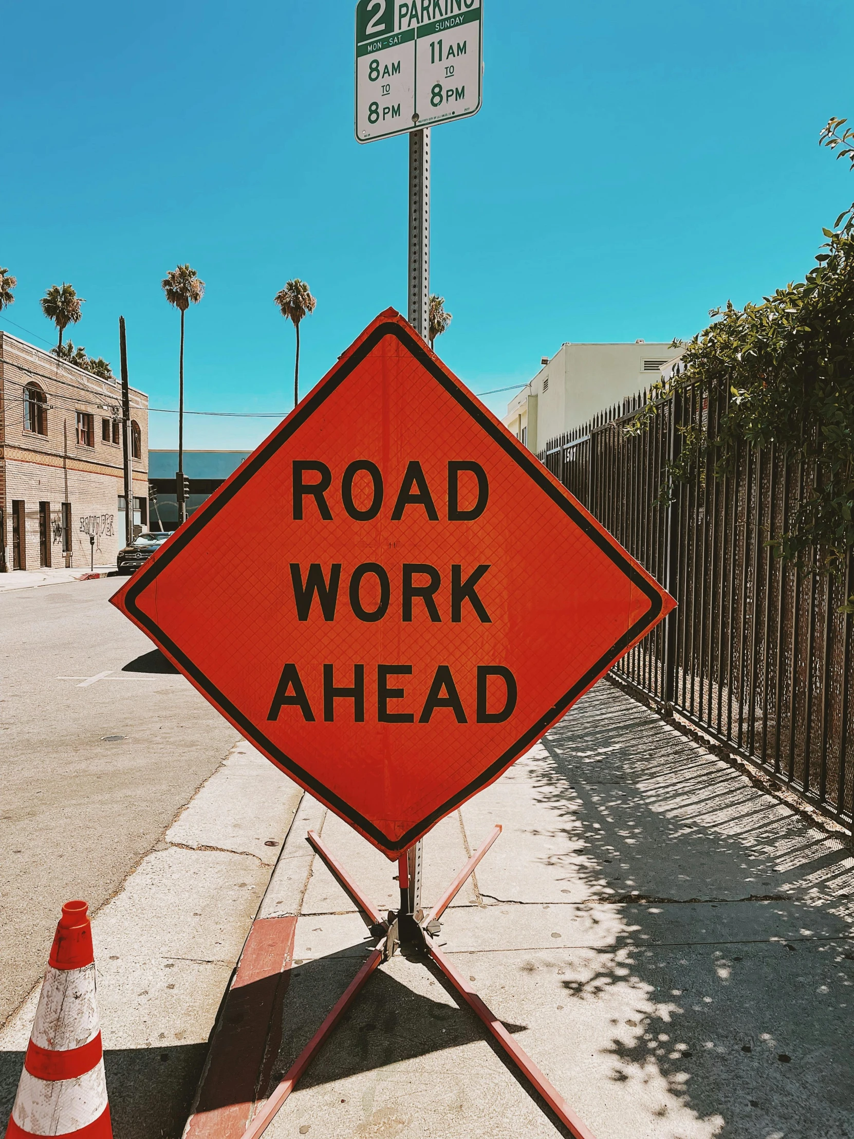 a road work ahead sign sitting on the side of a road, unsplash, happening, ilustration, stacked image, profile pic, thumbnail