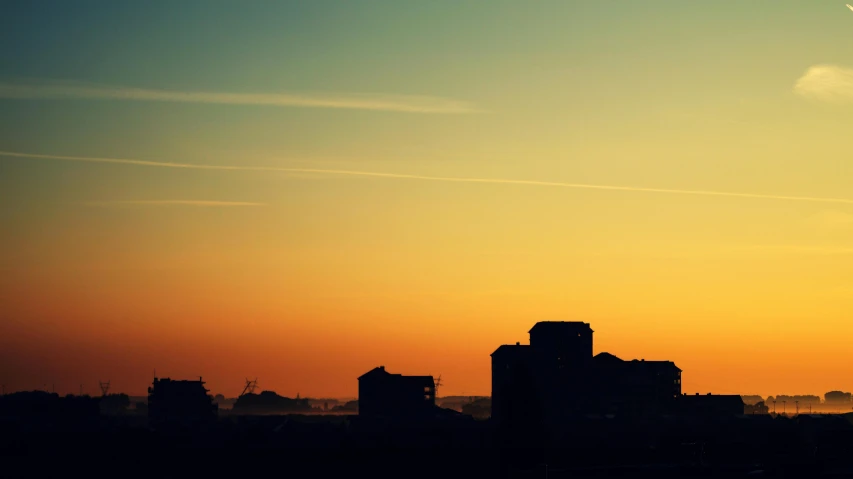 a plane flying over a city at sunset, by Jan Tengnagel, pexels contest winner, minimalism, silhouette :7, :: morning, industrial colours, sherbert sky