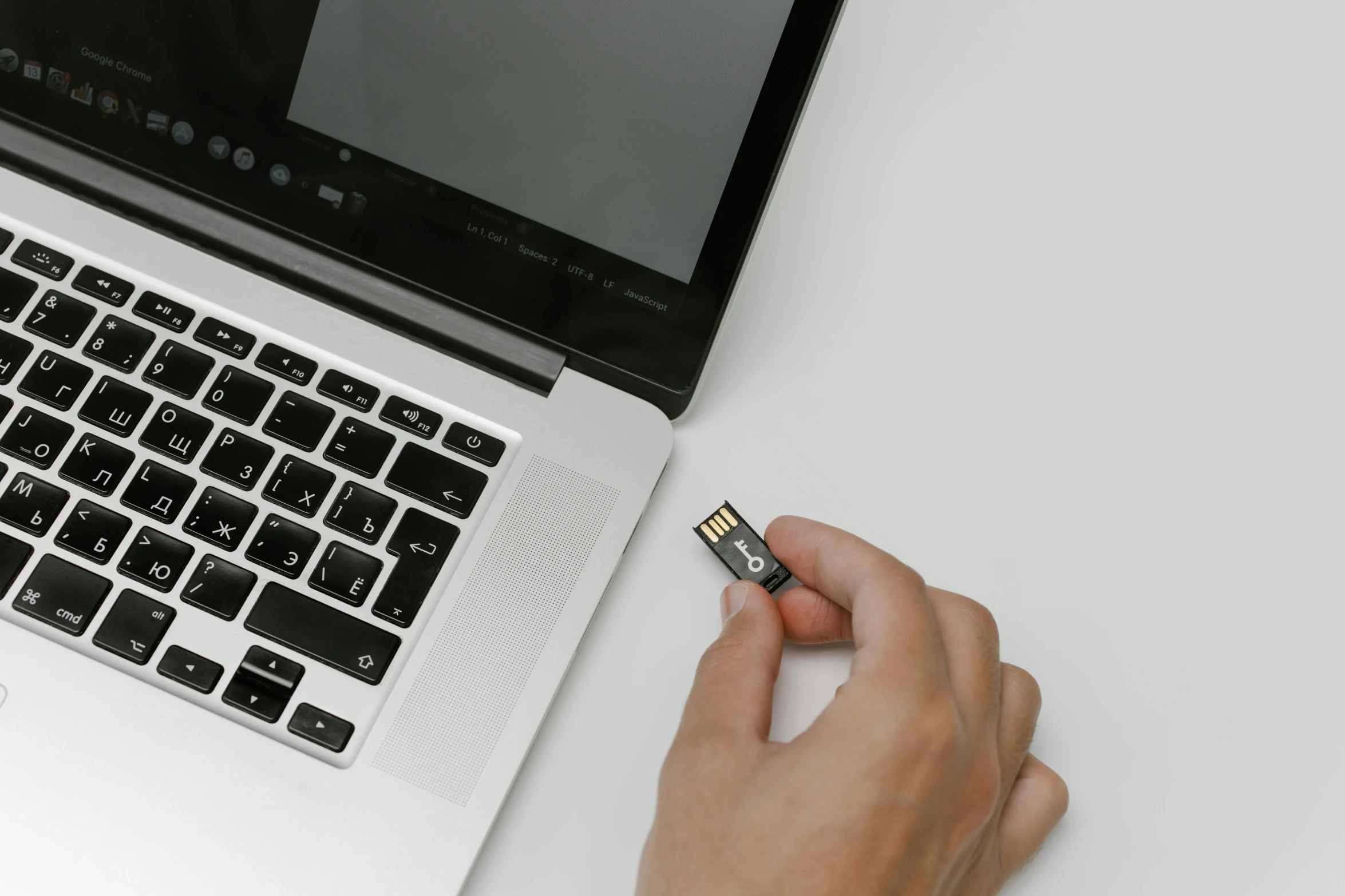 a close up of a person typing on a laptop, a computer rendering, by Matthias Stom, unsplash, the microchip, usb ports, on a gray background, low quality photo