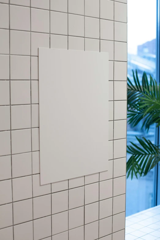 a white toilet sitting in a bathroom next to a window, a poster, inspired by Ian Hamilton Finlay, unsplash, office ceiling panels, real porcelain texture effect, けもの, metal panels