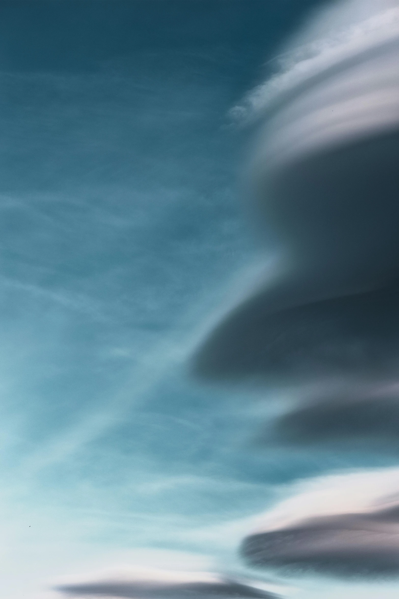 a bunch of clouds that are in the sky, inspired by Jan Rustem, unsplash, conceptual art, pareidolia, zoomed, tornado, f / 2. 8