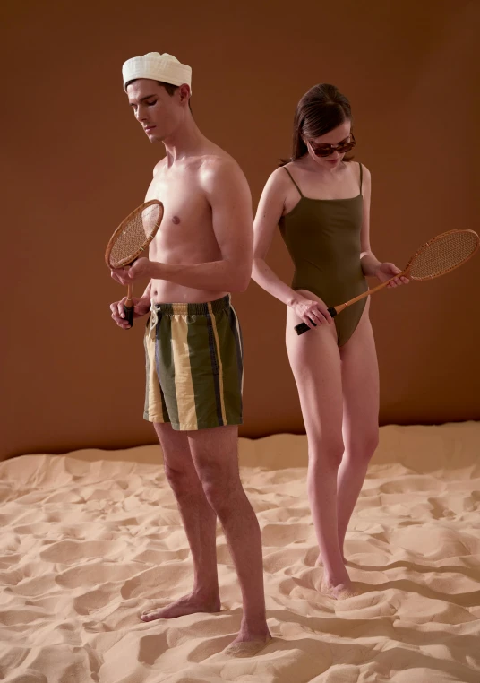 a couple of people that are standing in the sand, inspired by Balthus, instagram, bauhaus, playing tennis, is wearing a swimsuit, a green, medium