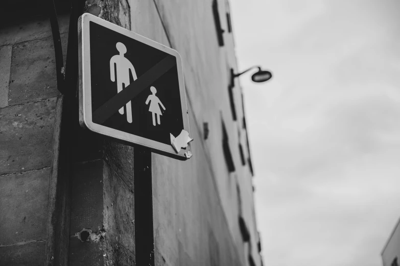 a black and white photo of a street sign, by Romain brook, unsplash, street art, fatherly, stick figure, no nudity, square