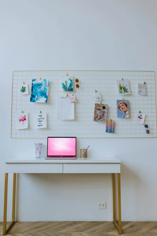 a laptop computer sitting on top of a white desk, a picture, pexels contest winner, ultra detailed wire decoration, art wall, pink and gold color scheme, whiteboards