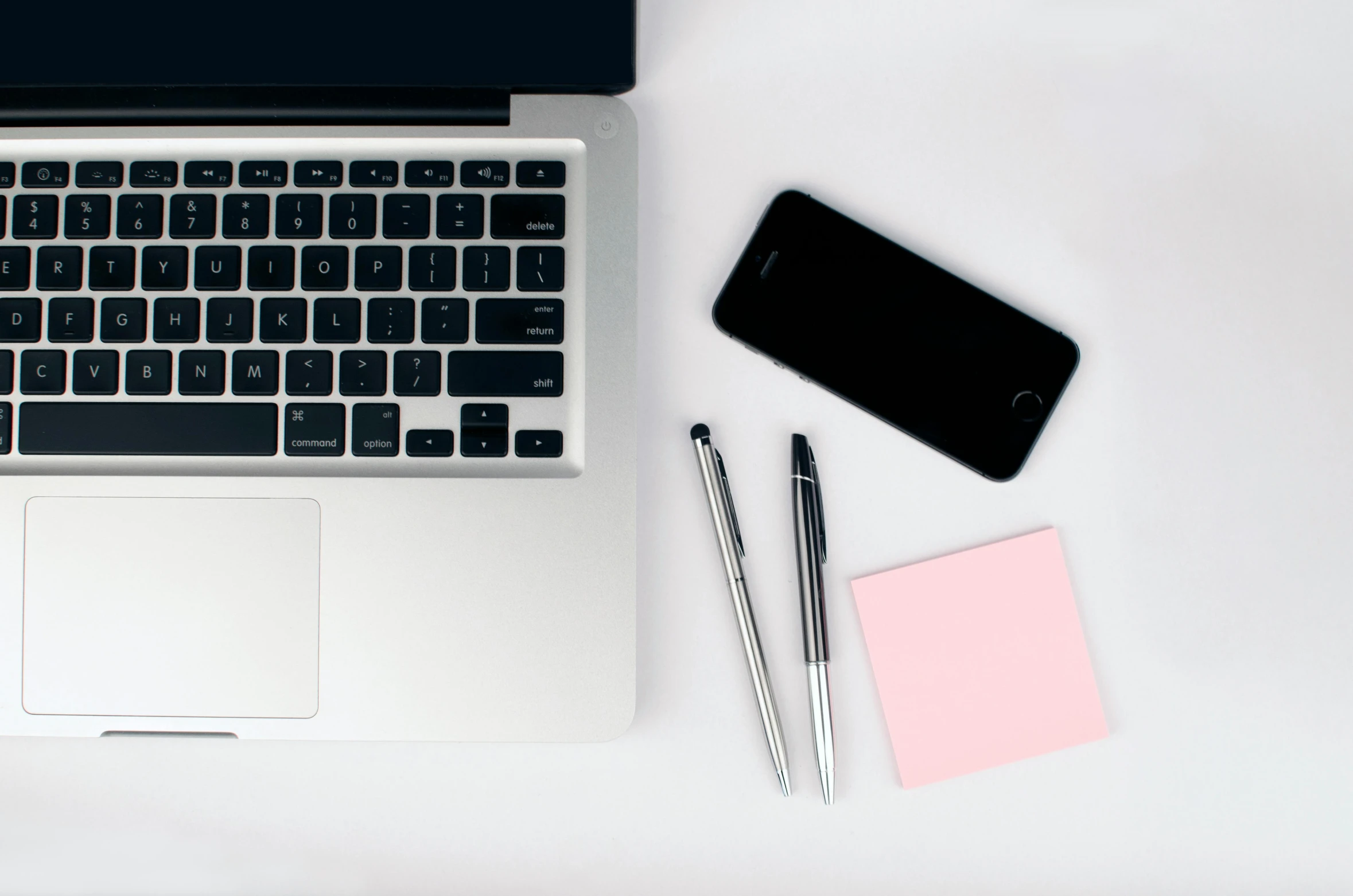 a laptop computer sitting on top of a white desk, trending on pexels, square, 1 2 9 7