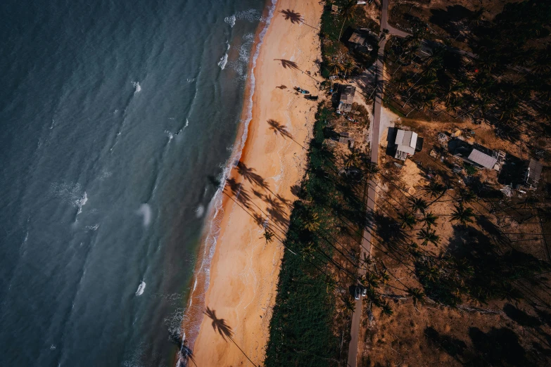 an aerial view of a beach next to the ocean, by Max Dauthendey, pexels contest winner, hurufiyya, low detailed, brown, thumbnail, multiple stories