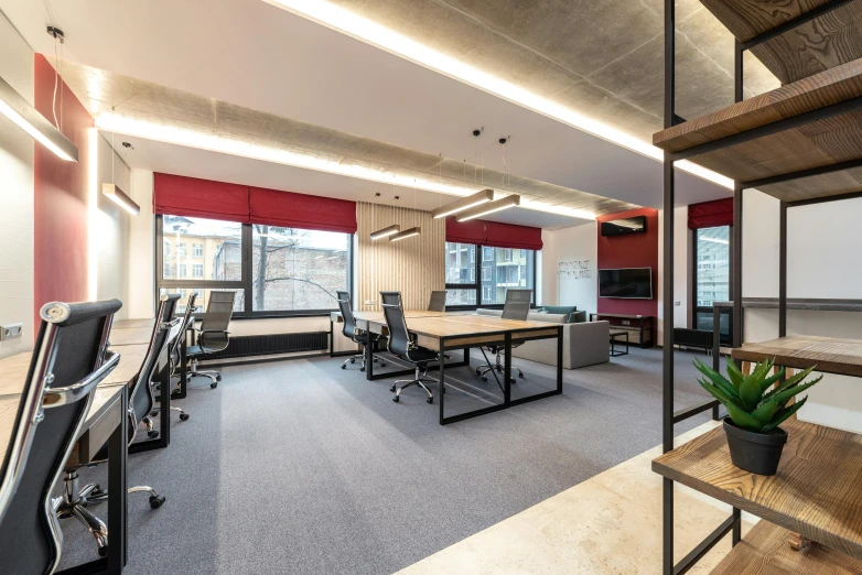 a conference room with desks, chairs, and a projector screen, by Emma Andijewska, unsplash, bauhaus, soft grey and red natural light, square, concrete hitech interior, artstation hq