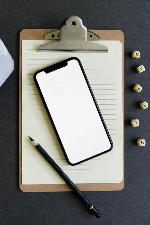 a cell phone sitting on top of a clipboard next to a calculator, trending on pexels, hypermodernism, 2 5 6 x 2 5 6 pixels, no - text no - logo, whiteboards, iphone 12