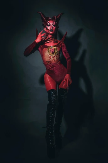 a woman in a devil costume posing for a picture, an album cover, inspired by Taro Yamamoto, featured on zbrush central, transgressive art, bodysuit, instagram photo, fullbody view, dagoth ur