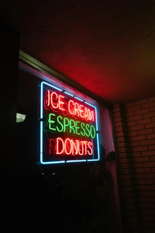 a neon sign that says ice cream and espresso donuts, by Jesse Richards, pexels, in style of nan goldin, lights inside, dos, hispanic