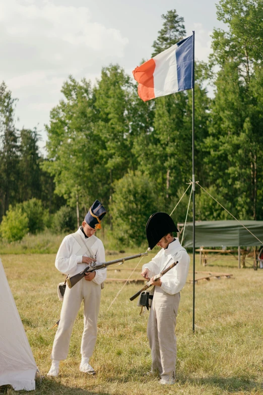 a group of men standing next to each other in a field, inspired by Édouard Detaille, unsplash, figuration libre, tournament, finland, live-action archival footage, directoire style