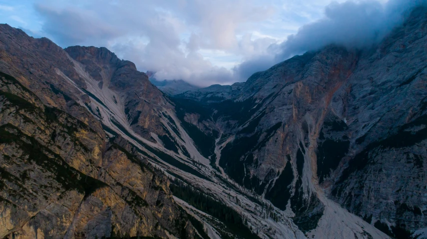 a group of people standing on top of a mountain, pexels contest winner, renaissance, cliff side at dusk, “ aerial view of a mountain, italy, high detail 4k