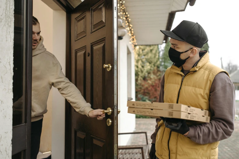 a man wearing a face mask opening a door, pexels contest winner, renaissance, sharing a pizza, delivering parsel box, greg rutkowski and ross tran, thumbnail