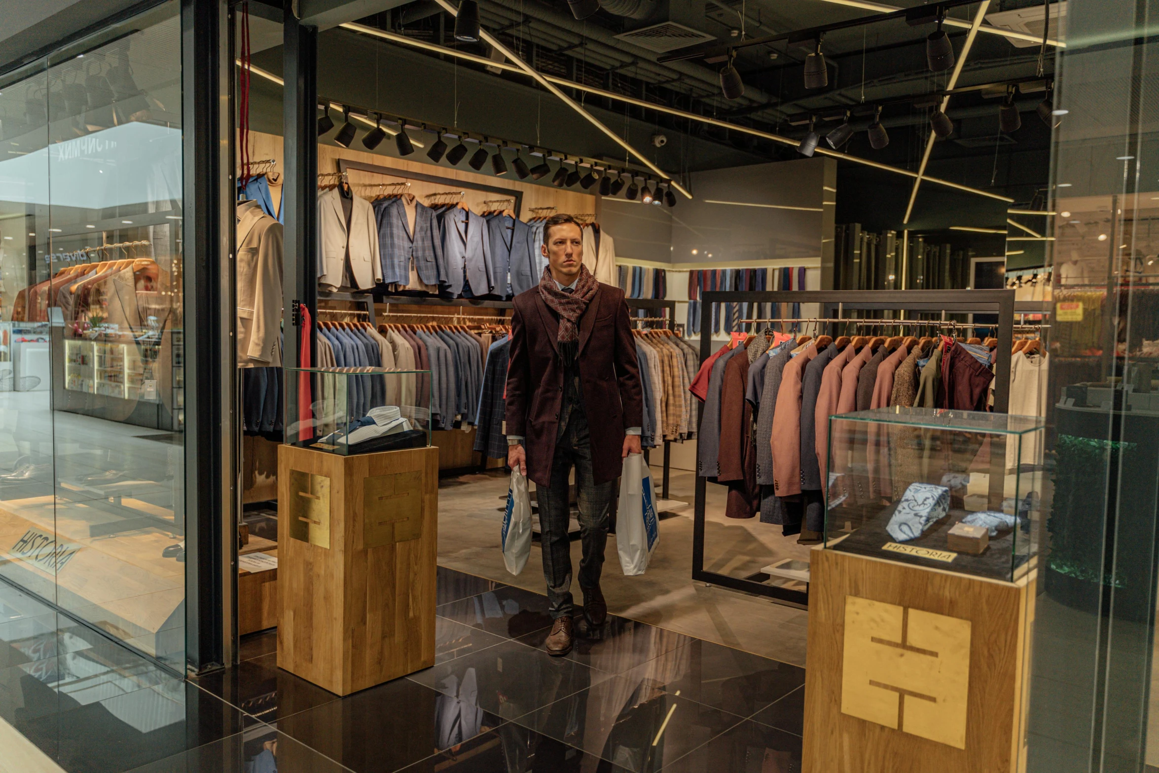 a man standing in front of a clothing store, anton fadeev 8 k, central hub, anomalisa, best photo