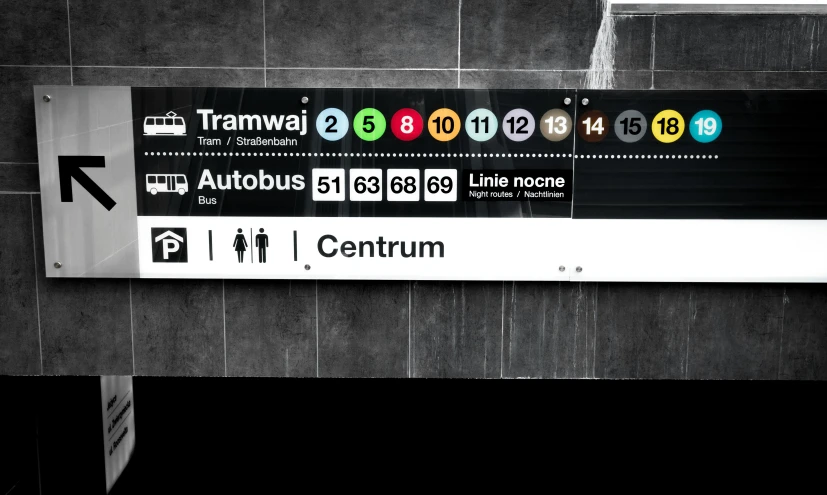 a black and white photo of a subway sign, a poster, trending on deviantart, architecture render, bus, tataru, central hub