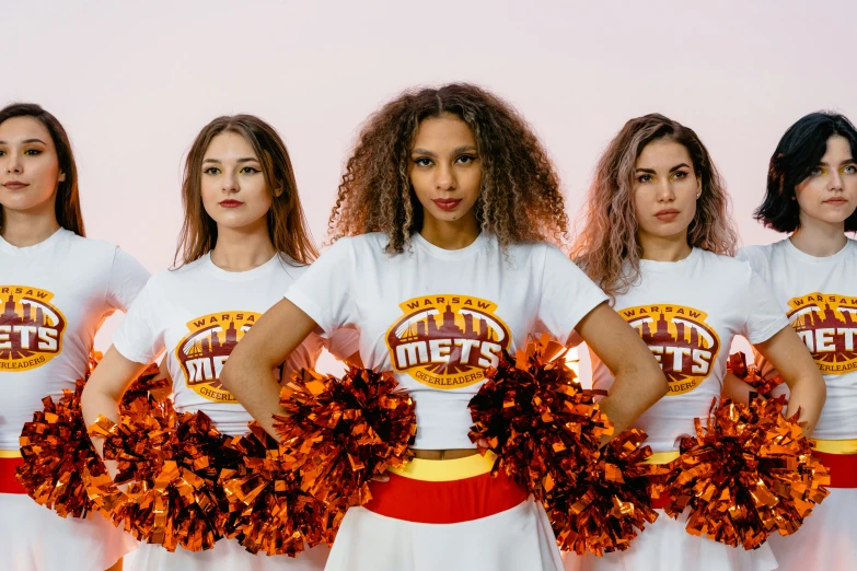 a group of women standing next to each other holding pom poms, pexels contest winner, sots art, covered in ketchup, white and orange breastplate, nfl, nets