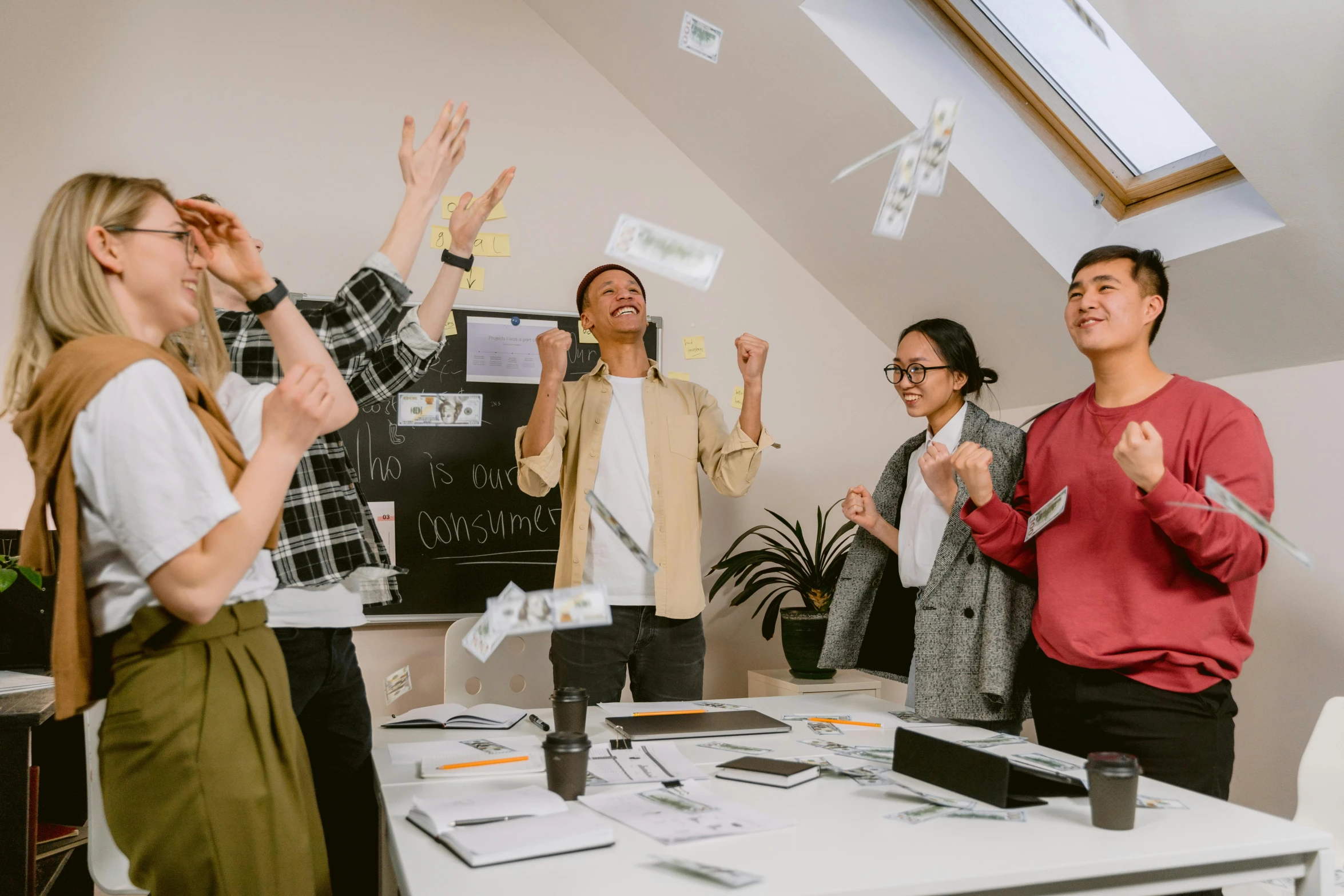 a group of people throwing papers in the air, pexels contest winner, on a desk, avatar image, squad, winning award image