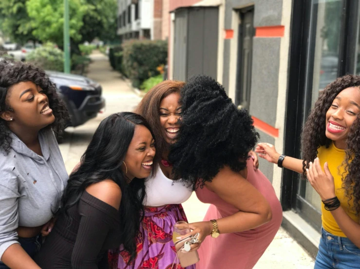 a group of women standing next to each other, by Carey Morris, pexels contest winner, happening, head bent back in laughter, beautiful city black woman only, vine twist, instagram picture