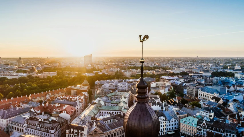 a view of a city from the top of a building, by Mathias Kollros, pexels contest winner, baroque, square, sunny sky, sundown, upscaled to high resolution