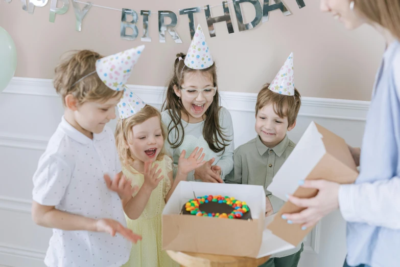 a group of children standing around a birthday cake, pexels contest winner, happening, avatar image, background image, candid portrait photo, cardboard