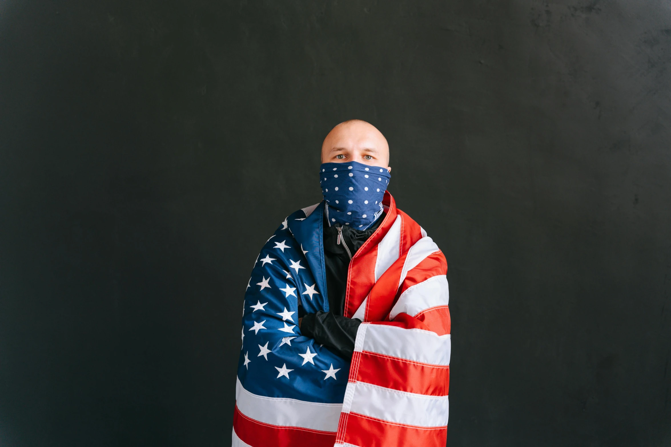 a man wrapped in an american flag blanket, a portrait, unsplash, renaissance, wearing facemask, bald man, neoprene, american veteran gi