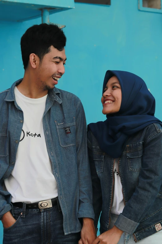 a man and a woman standing next to each other, pexels contest winner, hurufiyya, wearing a jeans jackets, kilin eng, profile pic, dialog