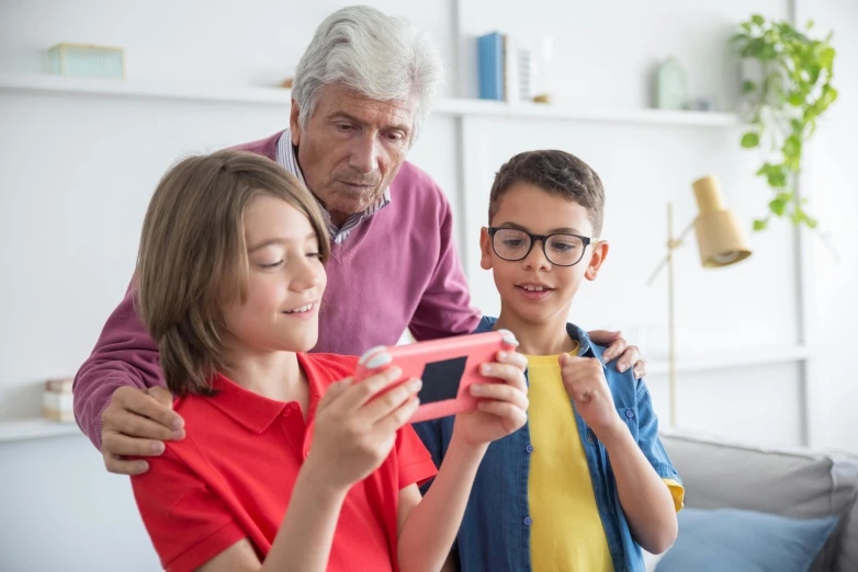 a man and two children looking at a cell phone, pexels contest winner, video game screenshot, an elderly, 15081959 21121991 01012000 4k, instagram post