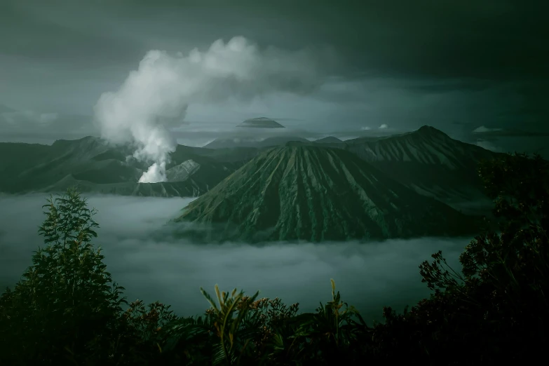 a view of a volcano from the top of a hill, by Alison Geissler, unsplash contest winner, sumatraism, under a gray foggy sky, ☁🌪🌙👩🏾, hd wallpaper, geysers of steam