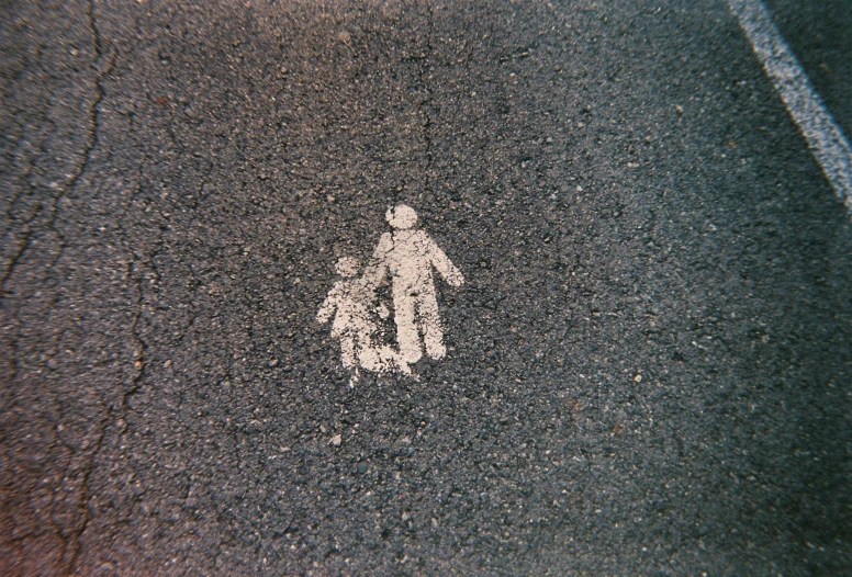 a white sign sitting on the side of a road, an album cover, by Quint Buchholz, unsplash, street art, child's drawing, ffffound, grainy black and white footage, covered with tar. dslr