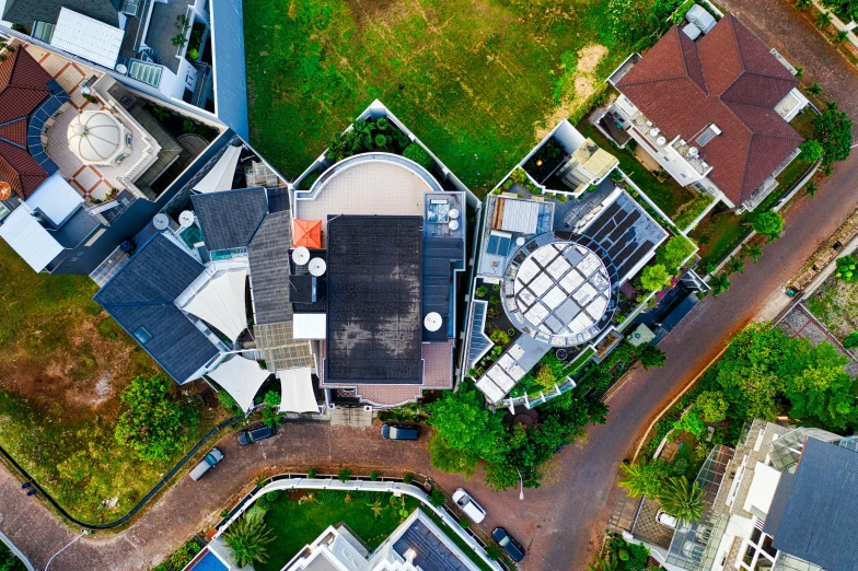 a bird's eye view of a residential area, pexels contest winner, modernism, rounded roof, south jakarta, ground angle uhd 8 k, large modern residence