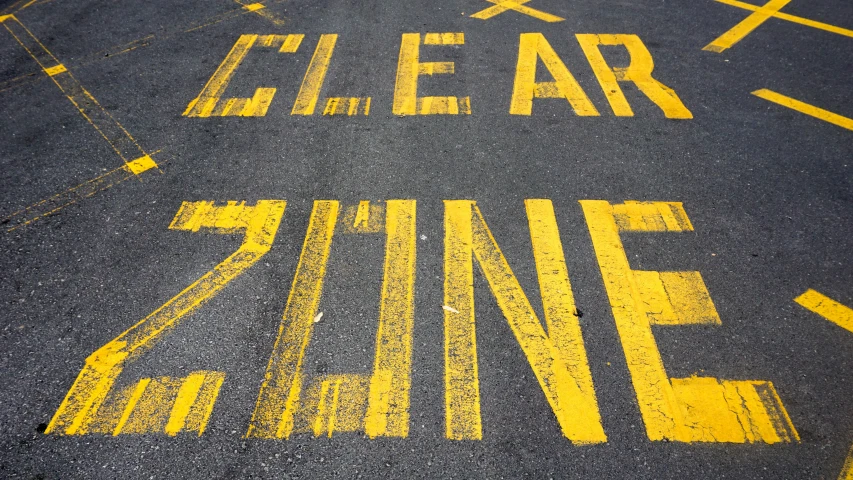 a parking lot with clear zone written on it, flickr, graffiti, runway, clearing, ultrafine detail ”, z ed