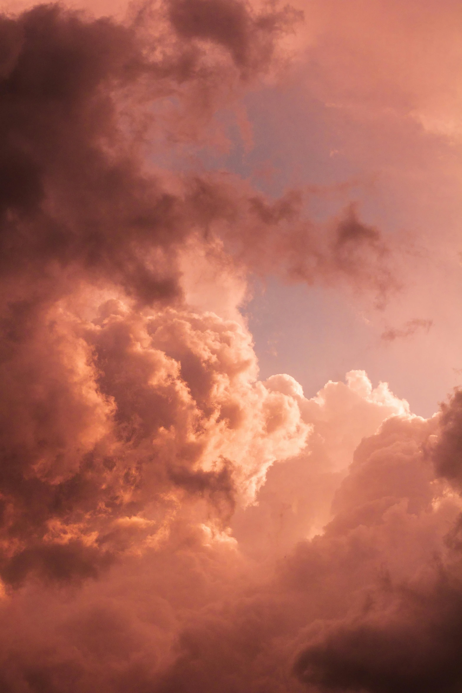 a large jetliner flying through a cloudy sky, an album cover, pexels contest winner, romanticism, pink storm clouds, in shades of peach, alessio albi, mammatus clouds