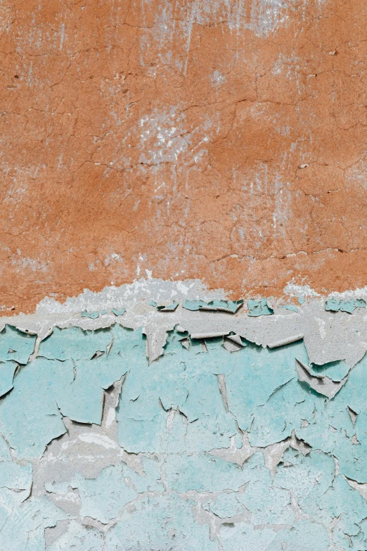 a close up of peeling paint on a wall, by Peter Churcher, trending on unsplash, cyan and orange, sand - colored walls, promo image, scientific photo