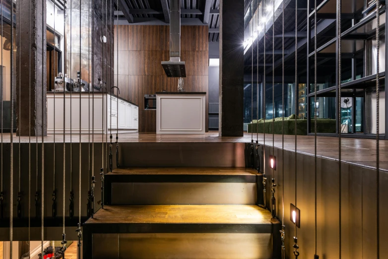 a bunch of stairs that are in a building, by Julia Pishtar, unsplash, chef table, dim accent lighting, penthouse, steel archways