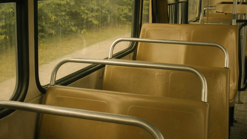 empty seats on a bus with trees in the background, by Attila Meszlenyi, flickr, hyperrealism, shiny gold, ignant, ( ( ( buses, pittsburgh