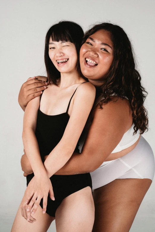 a couple of women standing next to each other, inspired by Wang Duo, big stomach, ethnicity : japanese, femalev beauty, supportive