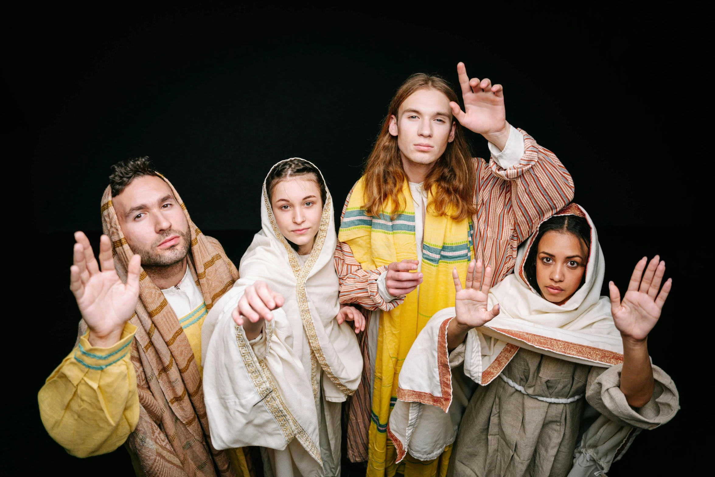 a group of people standing next to each other, inspired by Moses van Uyttenbroeck, renaissance, dressed like jesus christ, charli bowater and artgeem, press shot, four hands