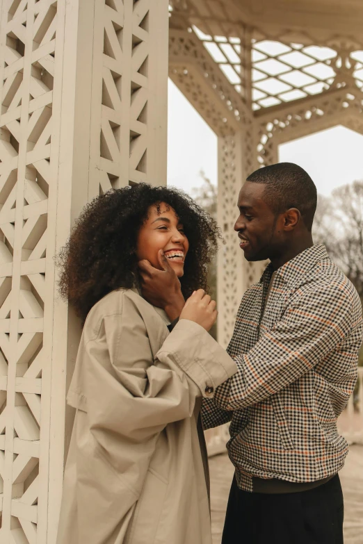 a man and woman standing next to each other, pexels contest winner, brown skinned, happy cozy feelings, date, well edited