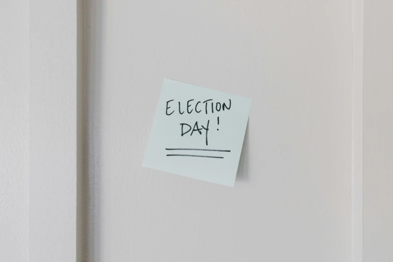 a piece of paper with the words election day written on it, pexels, square, hung above the door, gray, sticker