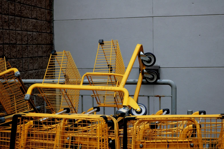 a bunch of shopping carts sitting in front of a building, yellow color scheme, thumbnail, seattle, square