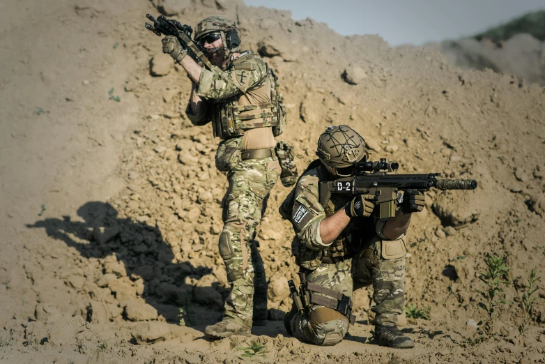 a couple of soldiers standing next to each other, by Adam Marczyński, shutterstock, airsoft cqb, on the ground, avatar image, performance