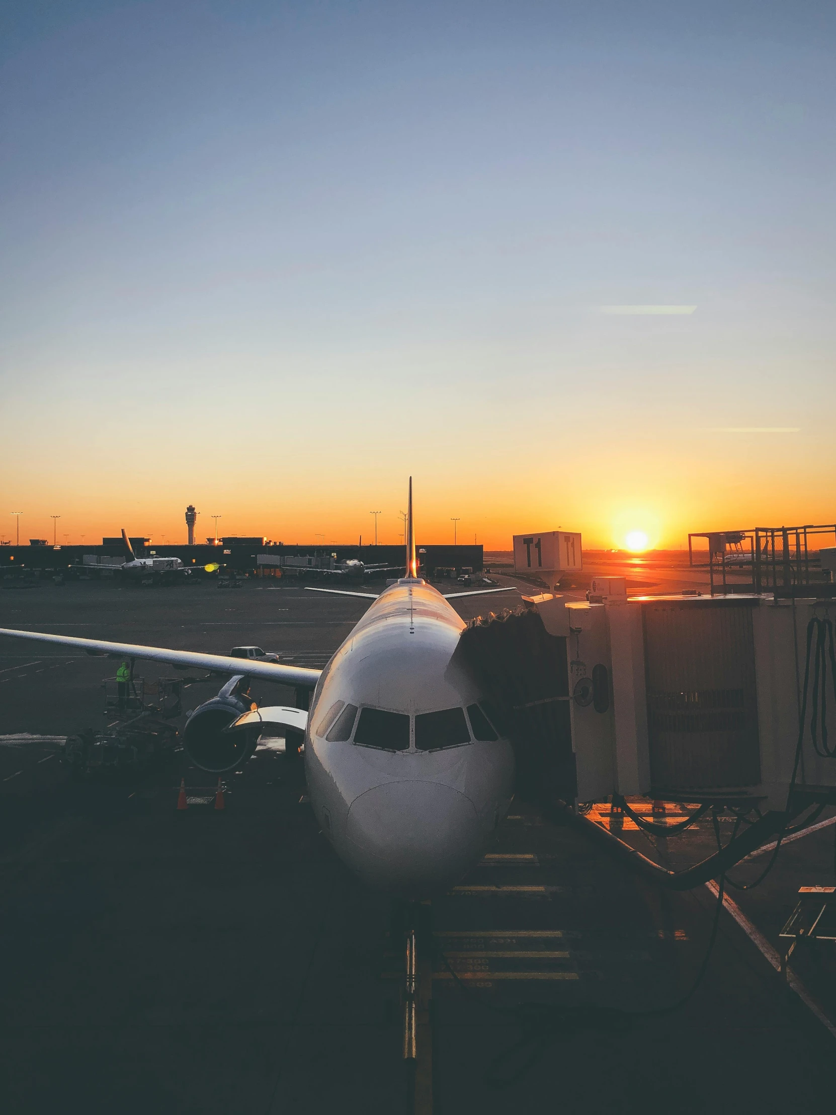 a large jetliner sitting on top of an airport tarmac, pexels contest winner, sunset!, instagram story, thumbnail, profile pic