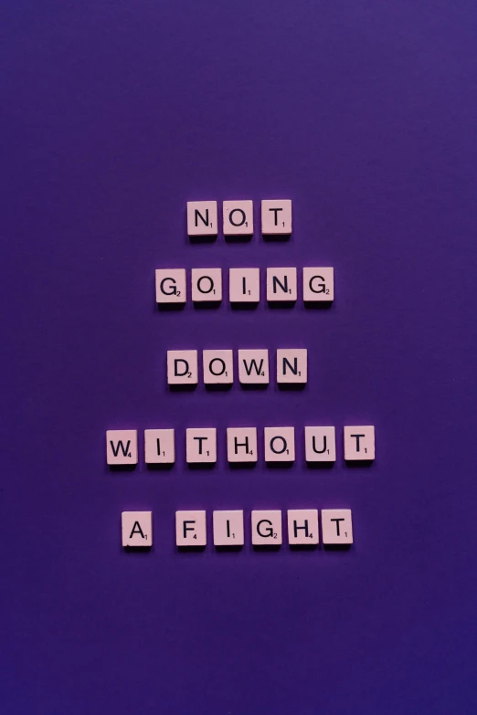 a sign that says not going down without a fight, inspired by Robert Fawcett, pexels contest winner, second colours - purple, 15081959 21121991 01012000 4k, no bricks, healthcare