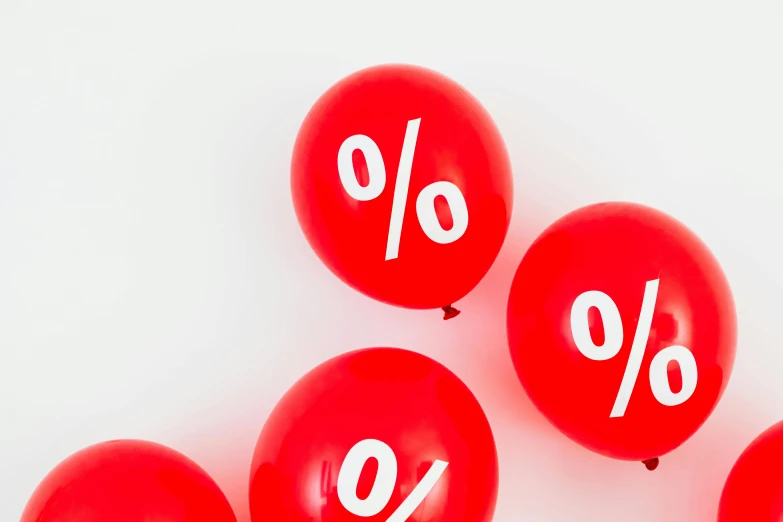 a group of red balloons with the word discount written on them, trending on unsplash, maths, ignant, society 6, dezeen