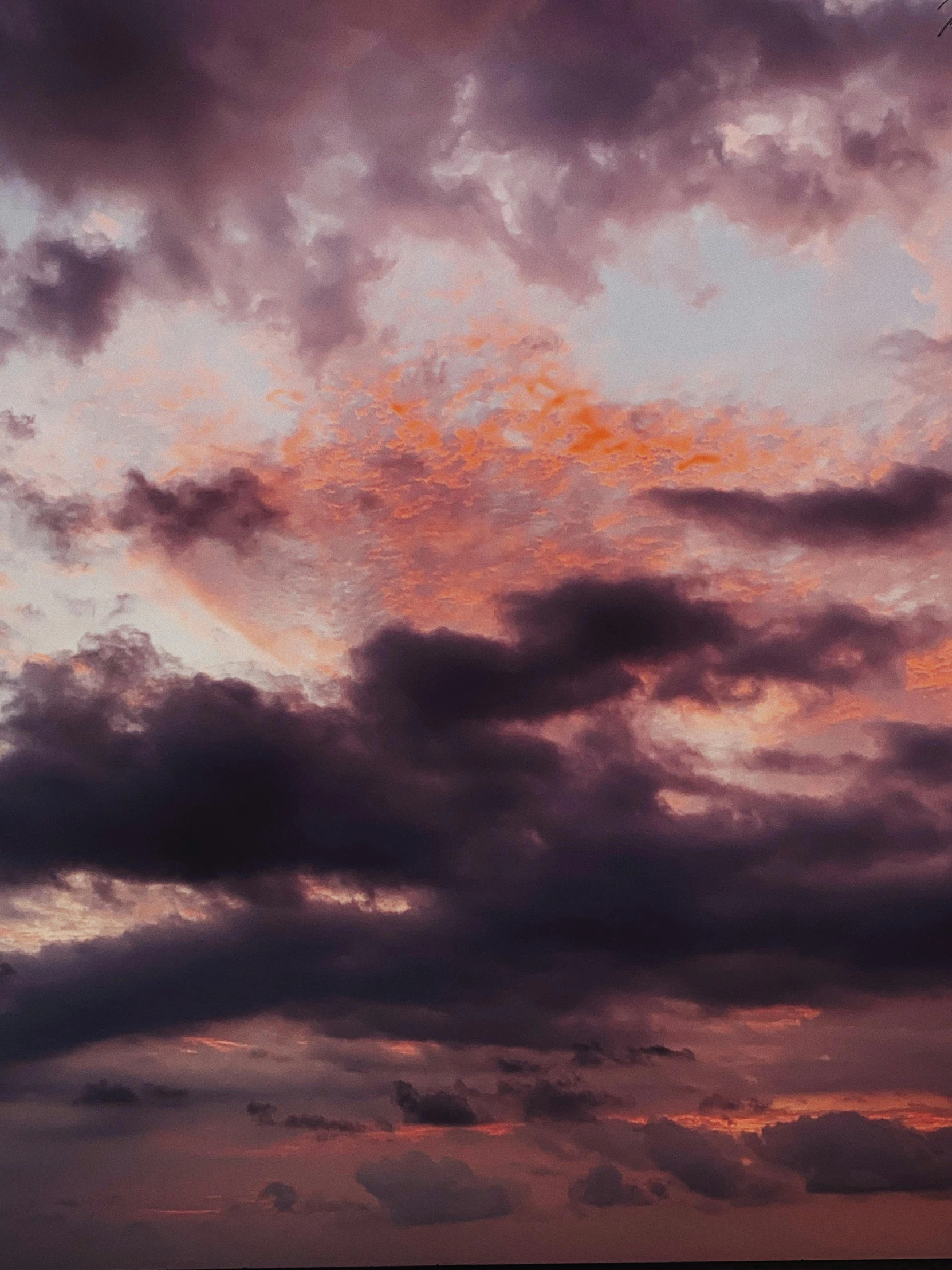 a couple of people standing on top of a beach under a cloudy sky, a picture, unsplash, romanticism, blood red sky, ☁🌪🌙👩🏾, panorama view of the sky, crepuscular!!