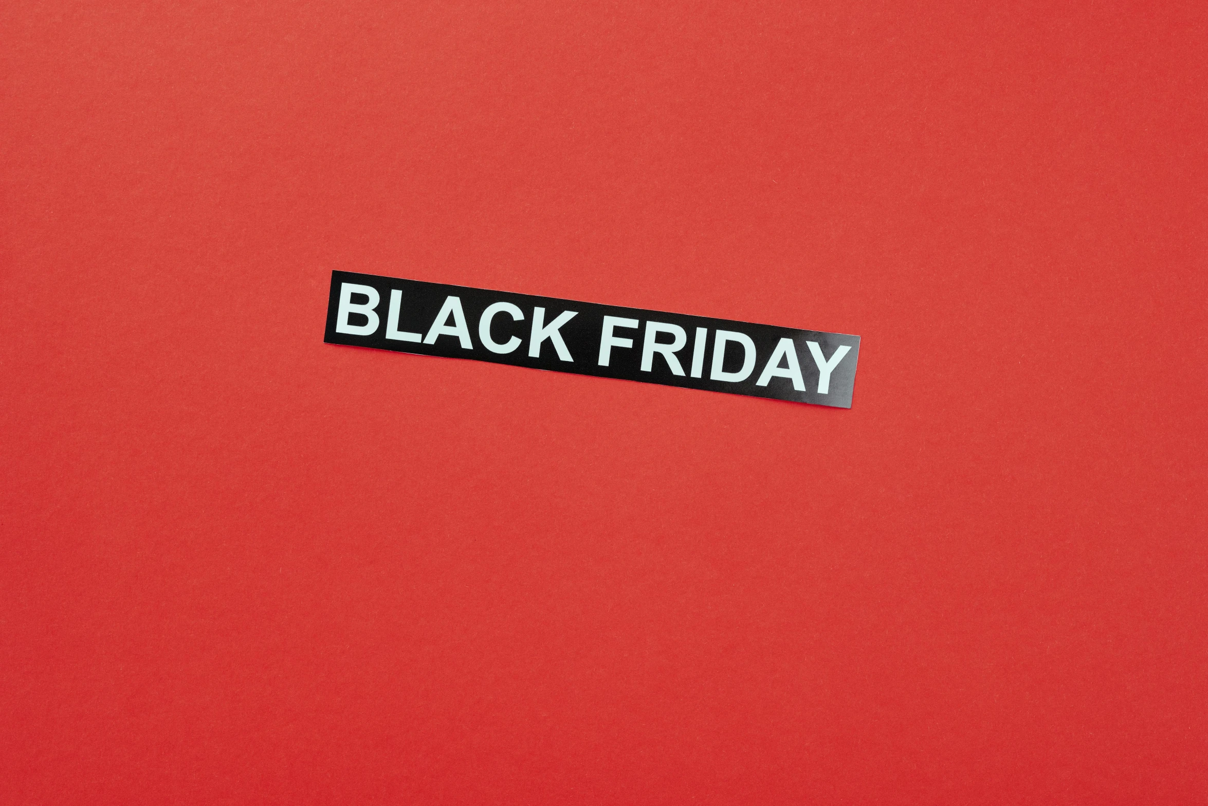 a black friday sticker on a red background, trending on pexels, hurufiyya, matte black paper, fancy dress, healthcare, long free black straight hair