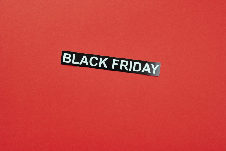 a black friday sticker on a red background, trending on pexels, hurufiyya, matte black paper, fancy dress, healthcare, long free black straight hair