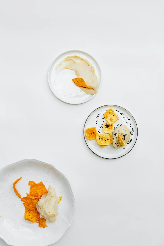 a white table topped with plates of food, inspired by Patrick Pietropoli, minimalism, ochre, on clear background, 2 1 0 mm, desserts