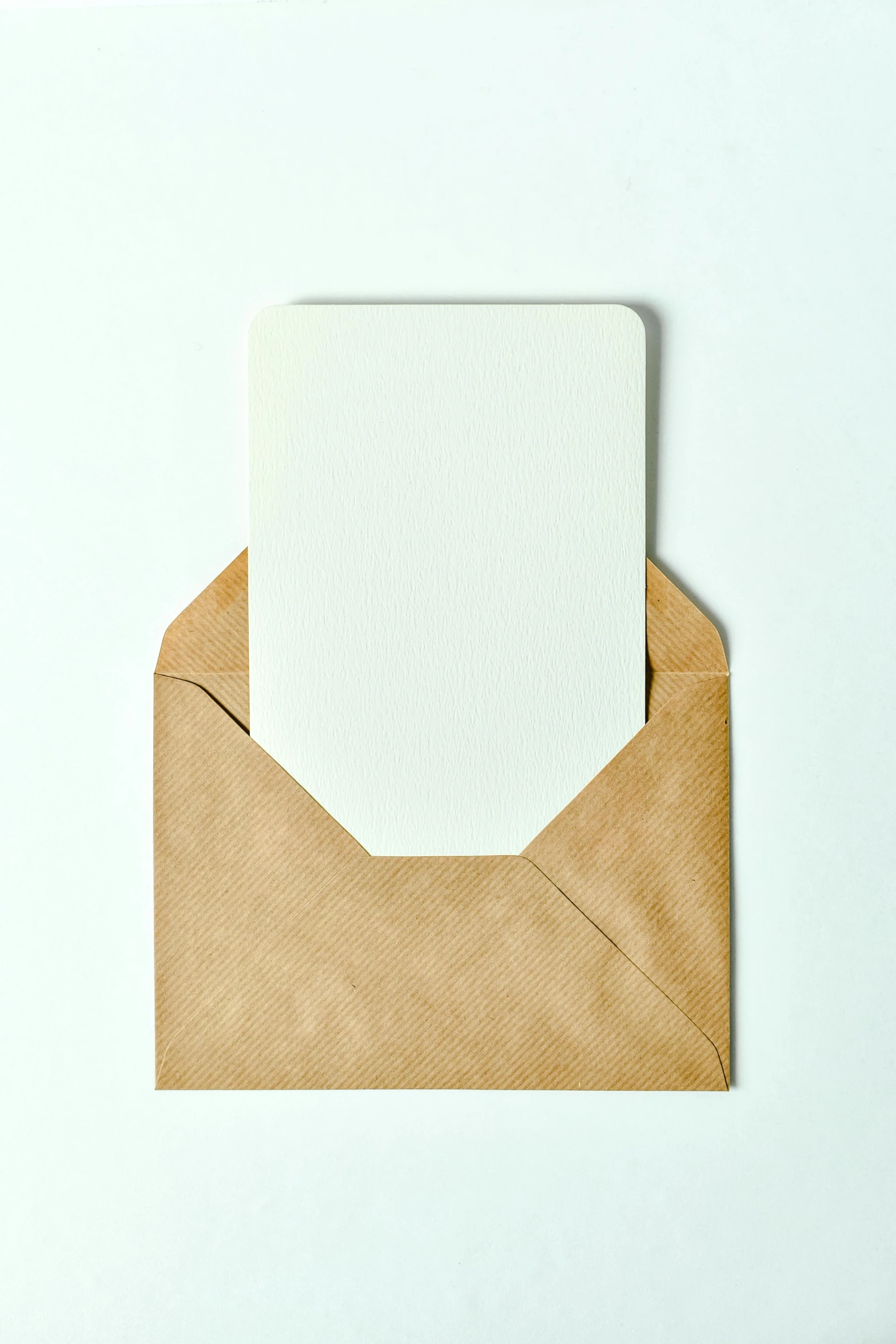 an open envelope with a blank card in it, by Carey Morris, 15081959 21121991 01012000 4k, square, angular minimalism, a cozy